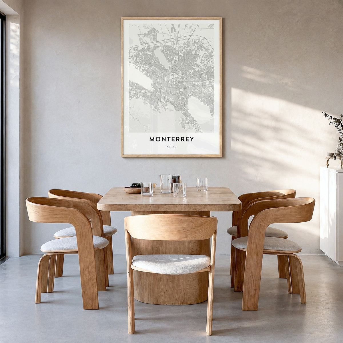 Monterrey Map Poster in a natural wood frame, hanging in a dining room