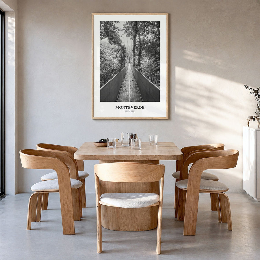 Monteverde Classic Poster in a natural wood frame, hanging in a dining room