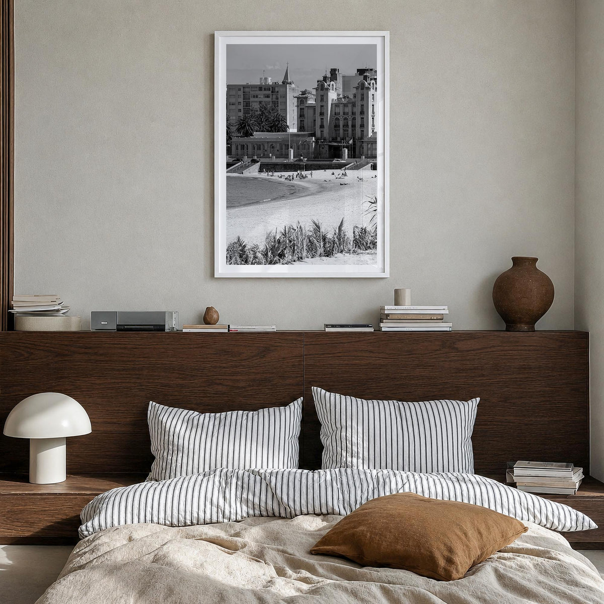 Montevideo black & white photo poster of Uruguay – vertical wall art in white wood frame with white border, hanging on wall
