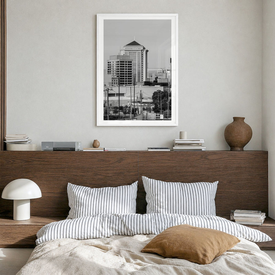 Montgomery Photo Poster in a white wood frame, hanging in a bedroom, white border