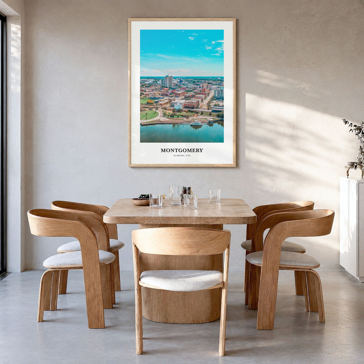 Montgomery Classic Poster in a natural wood frame, hanging in a dining room