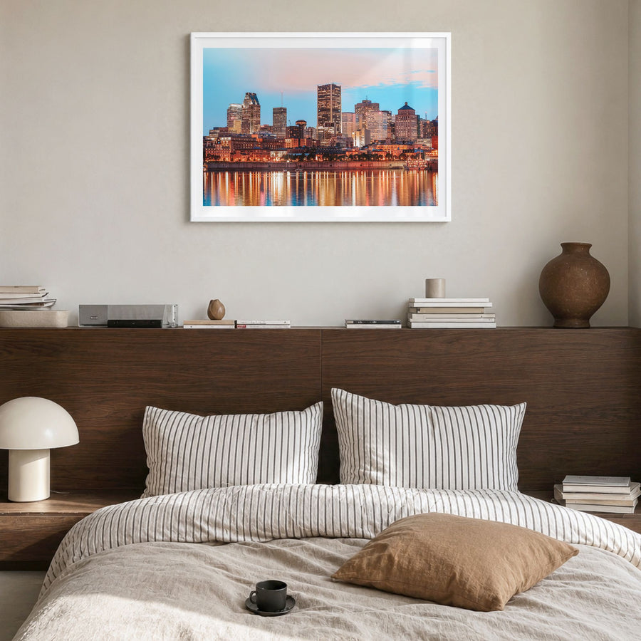 Montreal Photo Poster in a white wood frame, hanging in a bedroom, white border