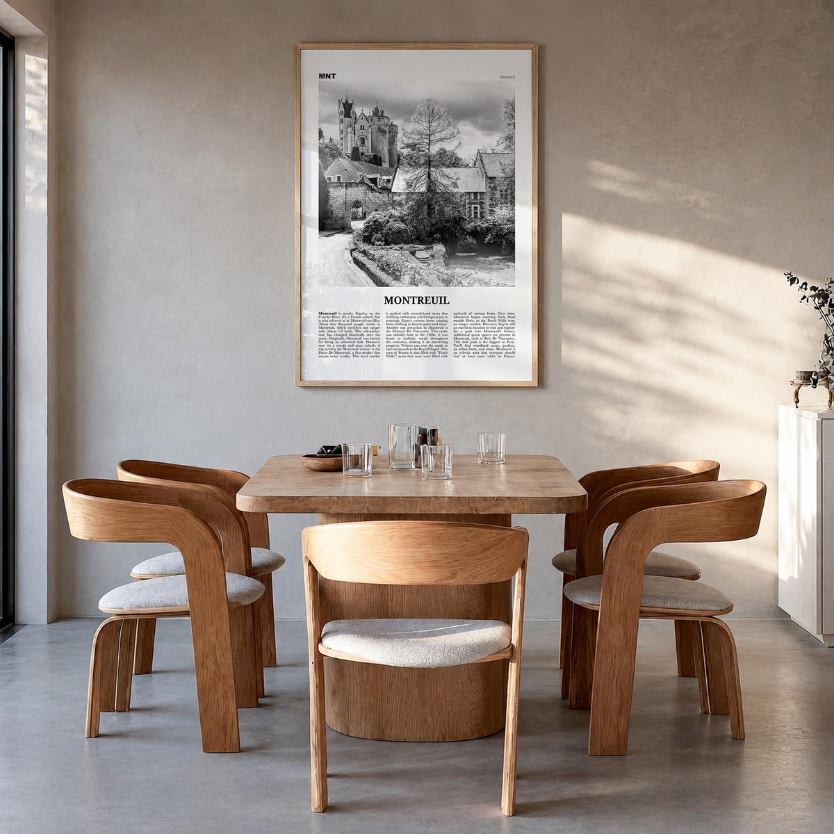 Montreuil black & white newspaper poster of France – vertical wall art in natural wood frame, hanging on wall
