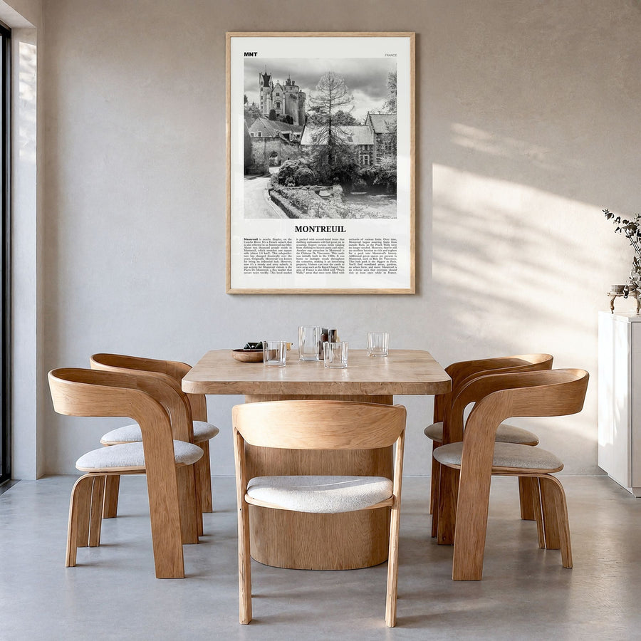 Montreuil Newspaper Poster in a natural wood frame, hanging in a dining room