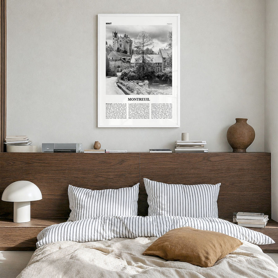 Montreuil Newspaper Poster in a white wood frame, hanging in a bedroom