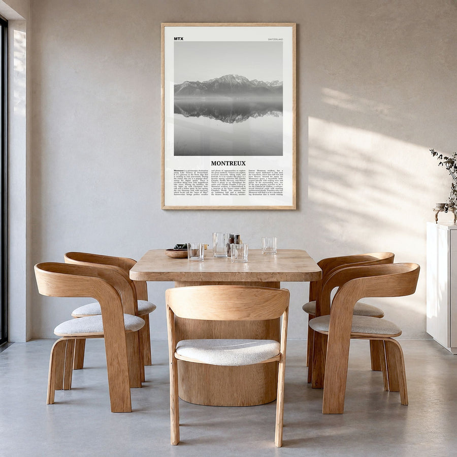 Montreux Newspaper Poster in a natural wood frame, hanging in a dining room