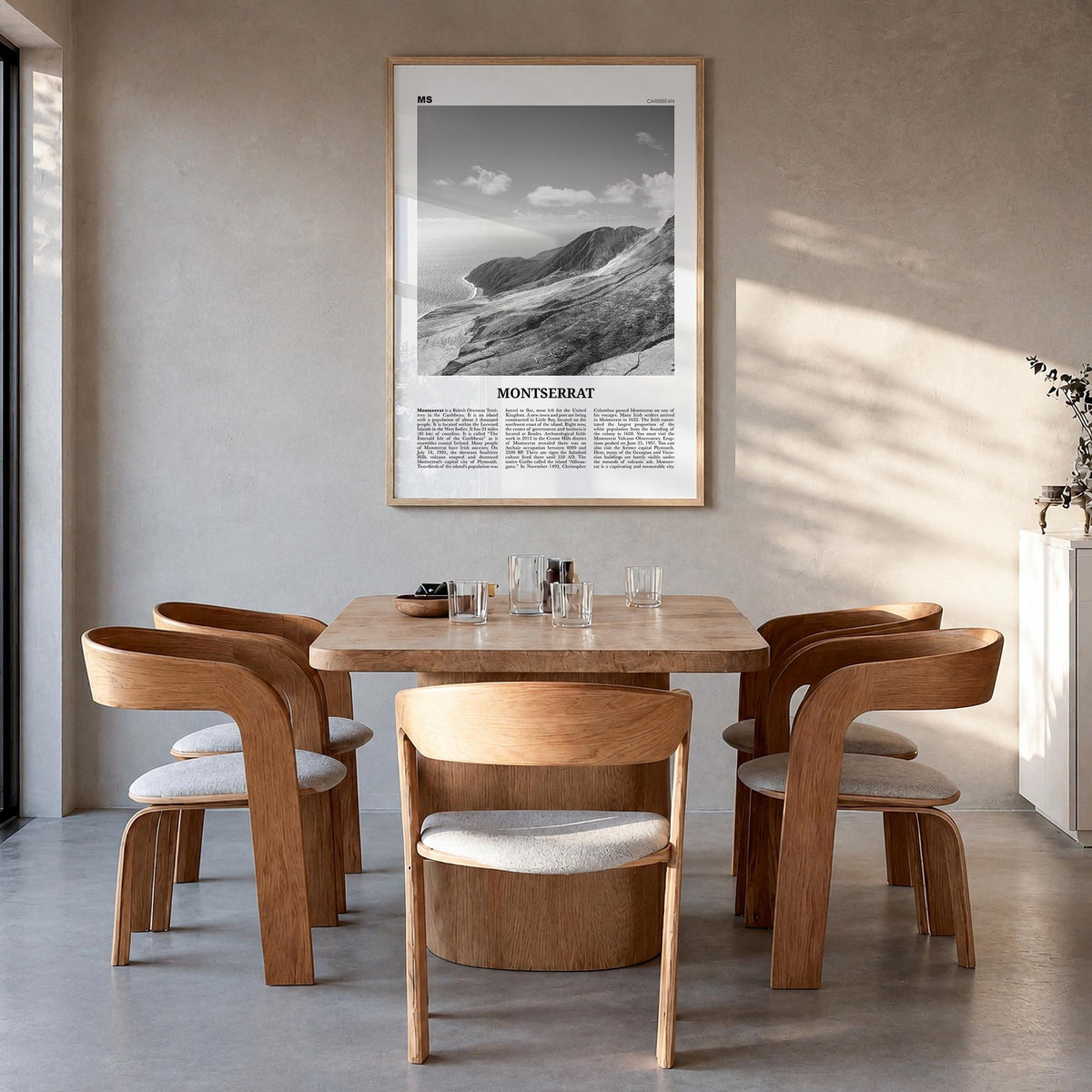 Montserrat black & white newspaper poster of Caribbean – vertical wall art in natural wood frame, hanging on wall