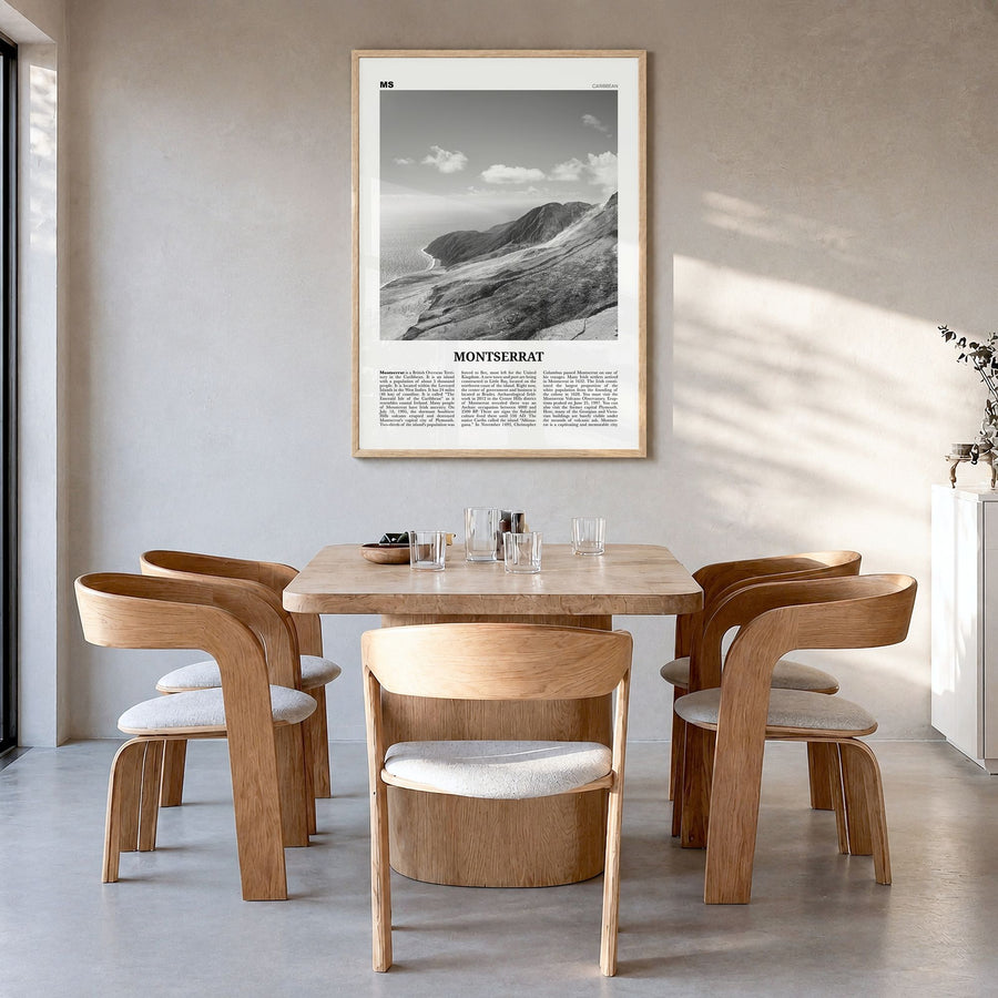 Montserrat, Caribbean Newspaper Poster in a natural wood frame, hanging in a dining room