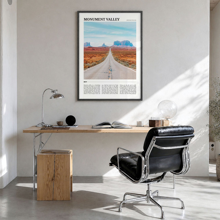 Monument Valley Travel Poster in a black wood frame, hanging in a bright home office