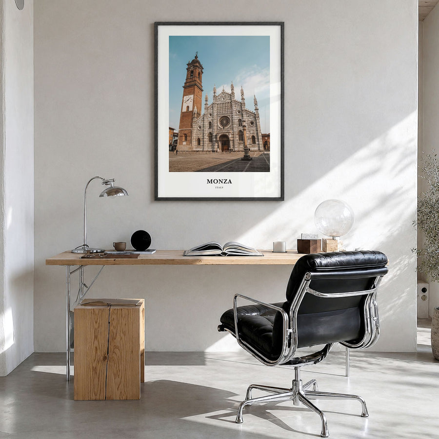 Monza Classic Poster in a black wood frame, hanging in a bright home office