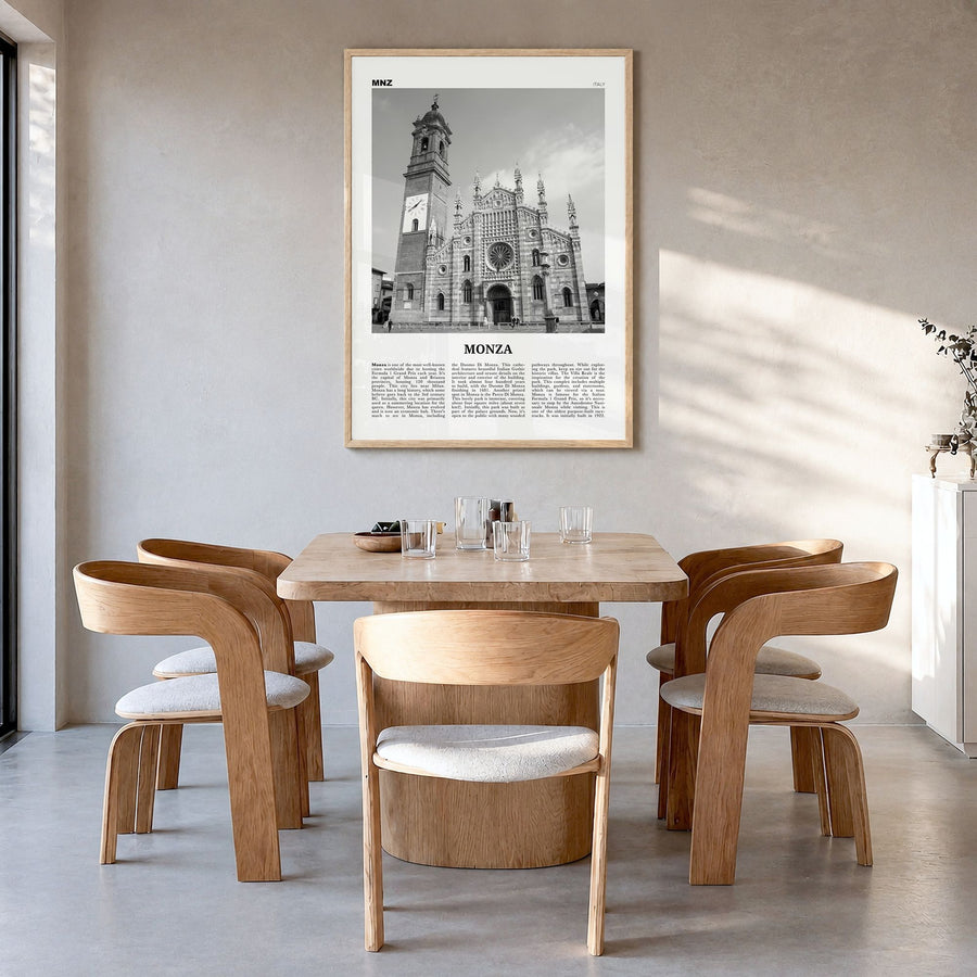 Monza Newspaper Poster in a natural wood frame, hanging in a dining room
