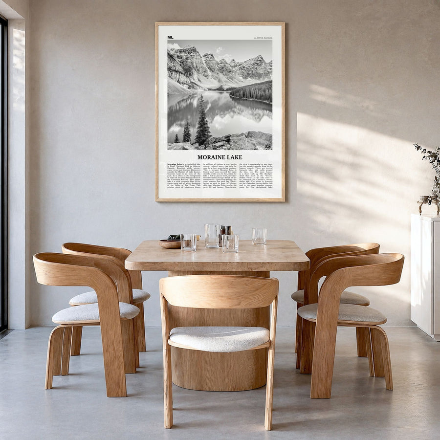 Moraine Lake Newspaper Poster in a natural wood frame, hanging in a dining room