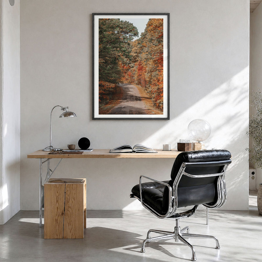 Morgantown Photo Poster in a black wood frame, hanging in a bright home office, white border