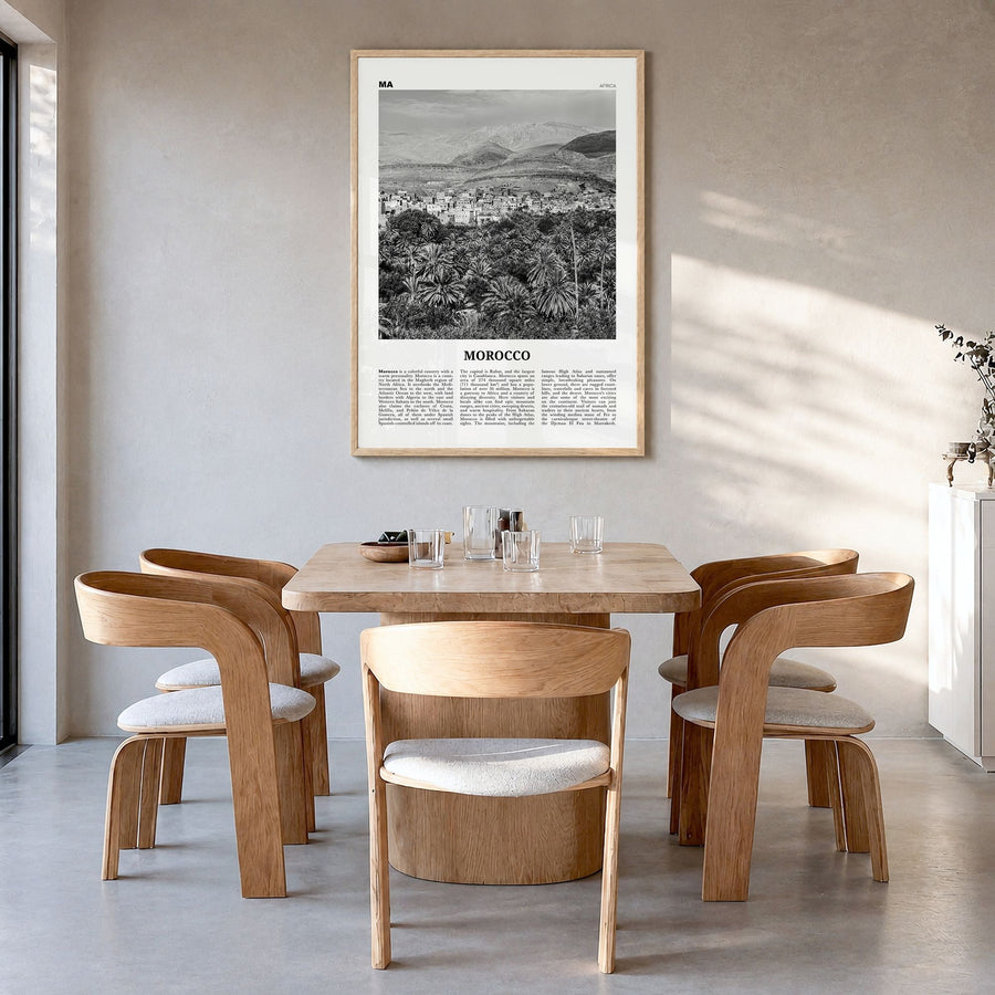 Morocco Newspaper Poster in a natural wood frame, hanging in a dining room
