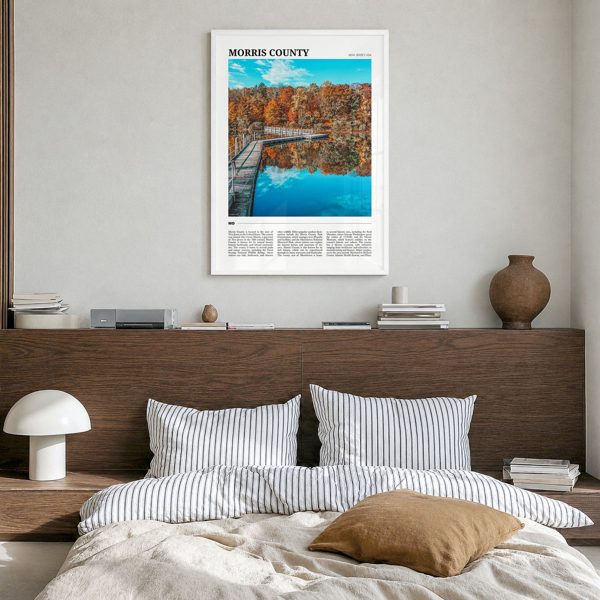 Morris County Travel Poster in a white wood frame, hanging in a bedroom