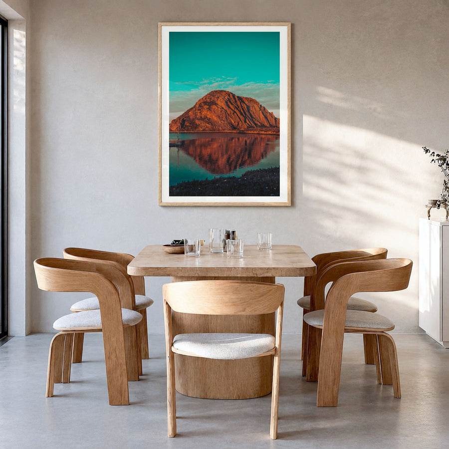 Morro Bay Photo No 1 Poster in a natural wood frame, hanging in a dining room, white border