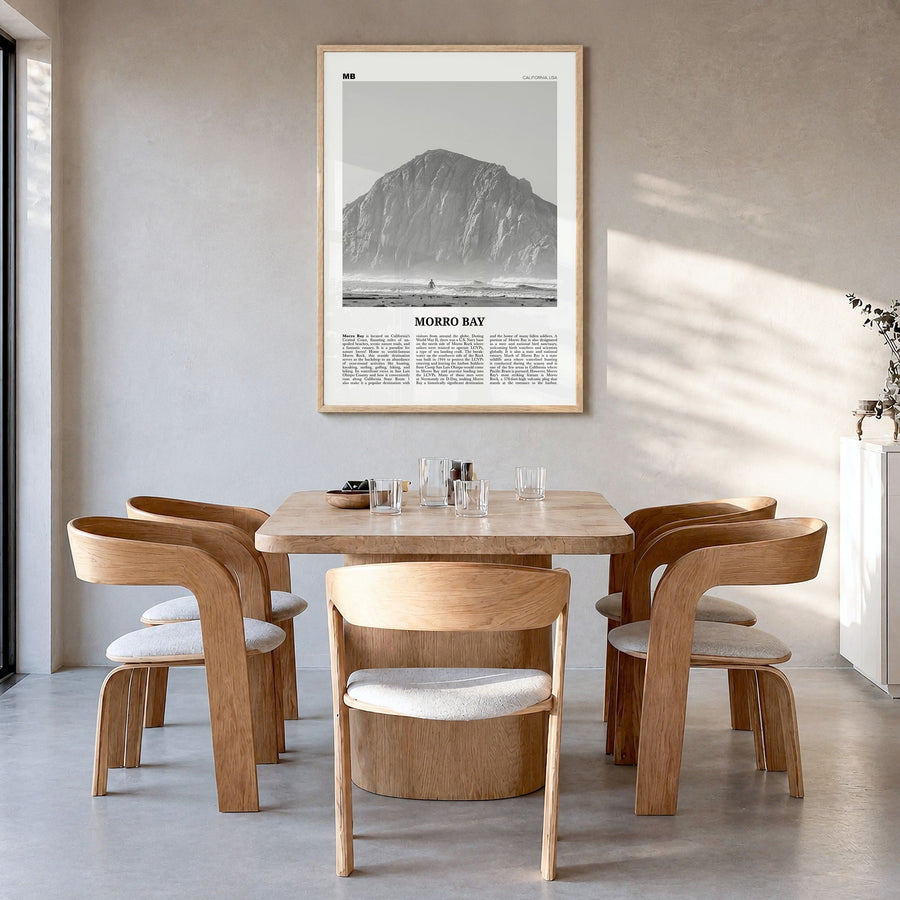 Morro Bay Newspaper No 1 Poster in a natural wood frame, hanging in a dining room
