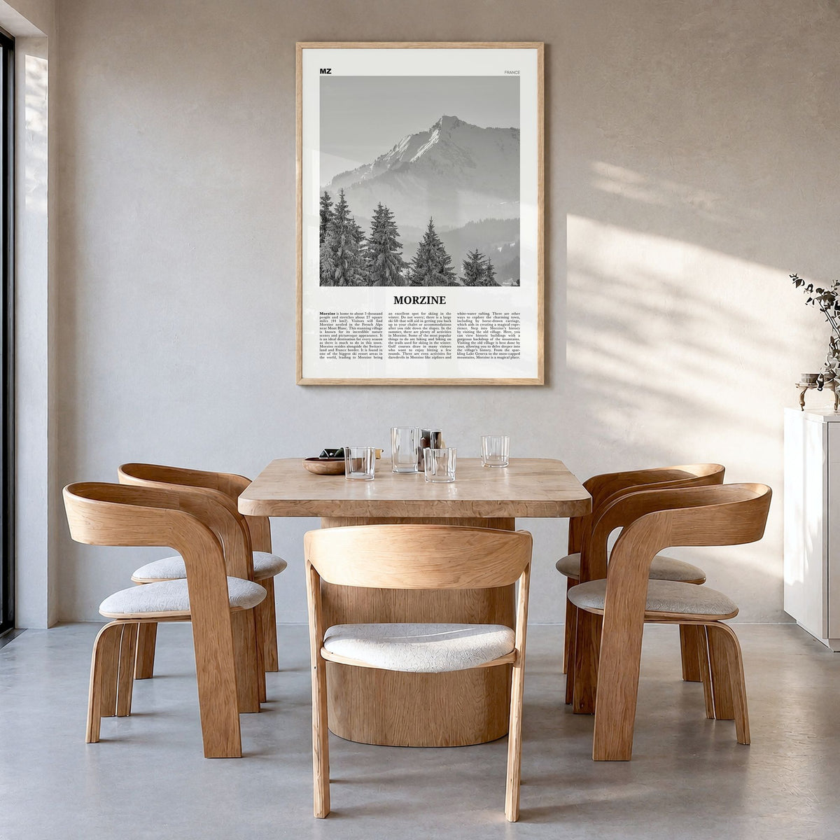 Morzine Newspaper Poster in a natural wood frame, hanging in a dining room
