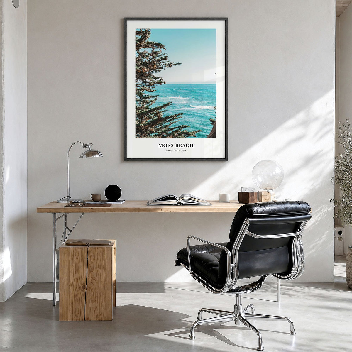 Moss Beach Classic Poster in a black wood frame, hanging in a bright home office