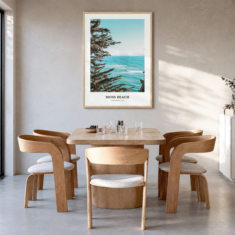 Moss Beach Classic Poster in a natural wood frame, hanging in a dining room