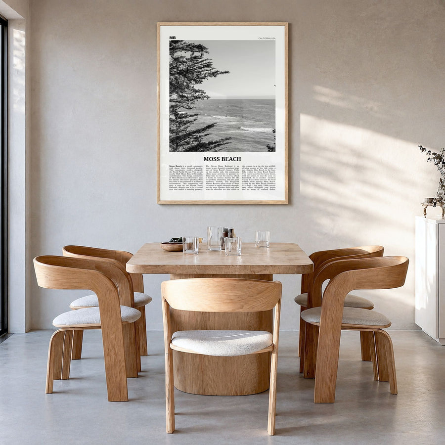 Moss Beach Newspaper Poster in a natural wood frame, hanging in a dining room