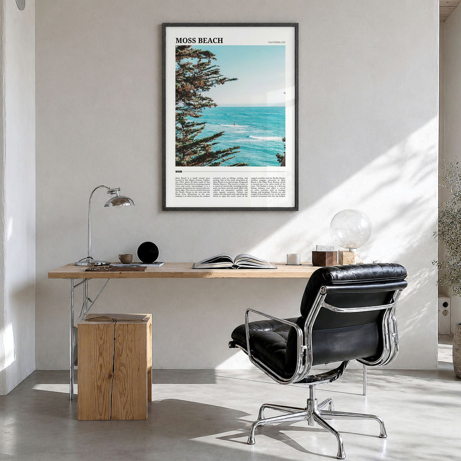 Moss Beach Travel Poster in a black wood frame, hanging in a bright home office