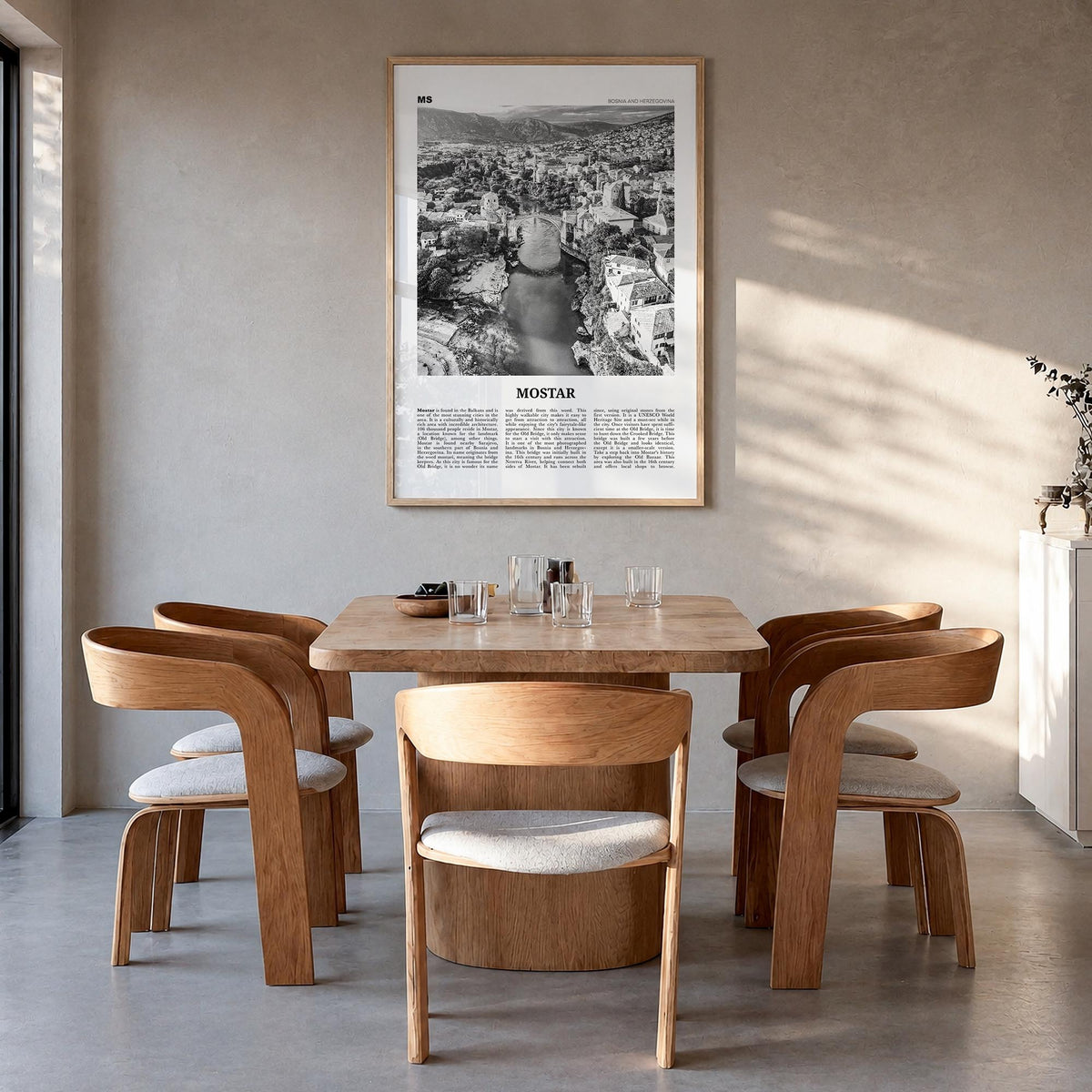 Mostar black & white newspaper poster of Bosnia and Herzegovina – vertical wall art in natural wood frame, hanging on wall