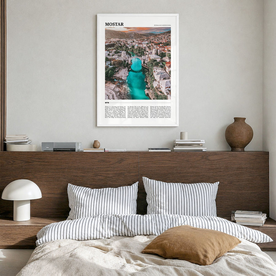 Mostar Travel Poster in a white wood frame, hanging in a bedroom