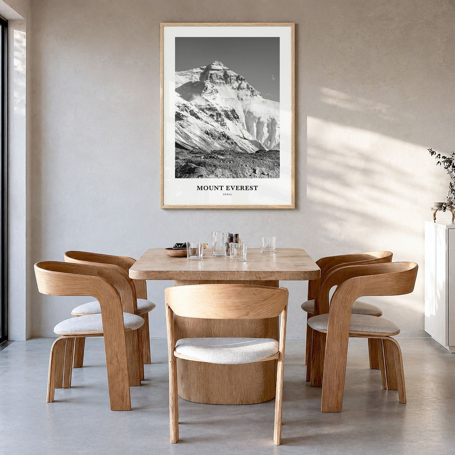 Mount Everest Classic Poster in a natural wood frame, hanging in a dining room