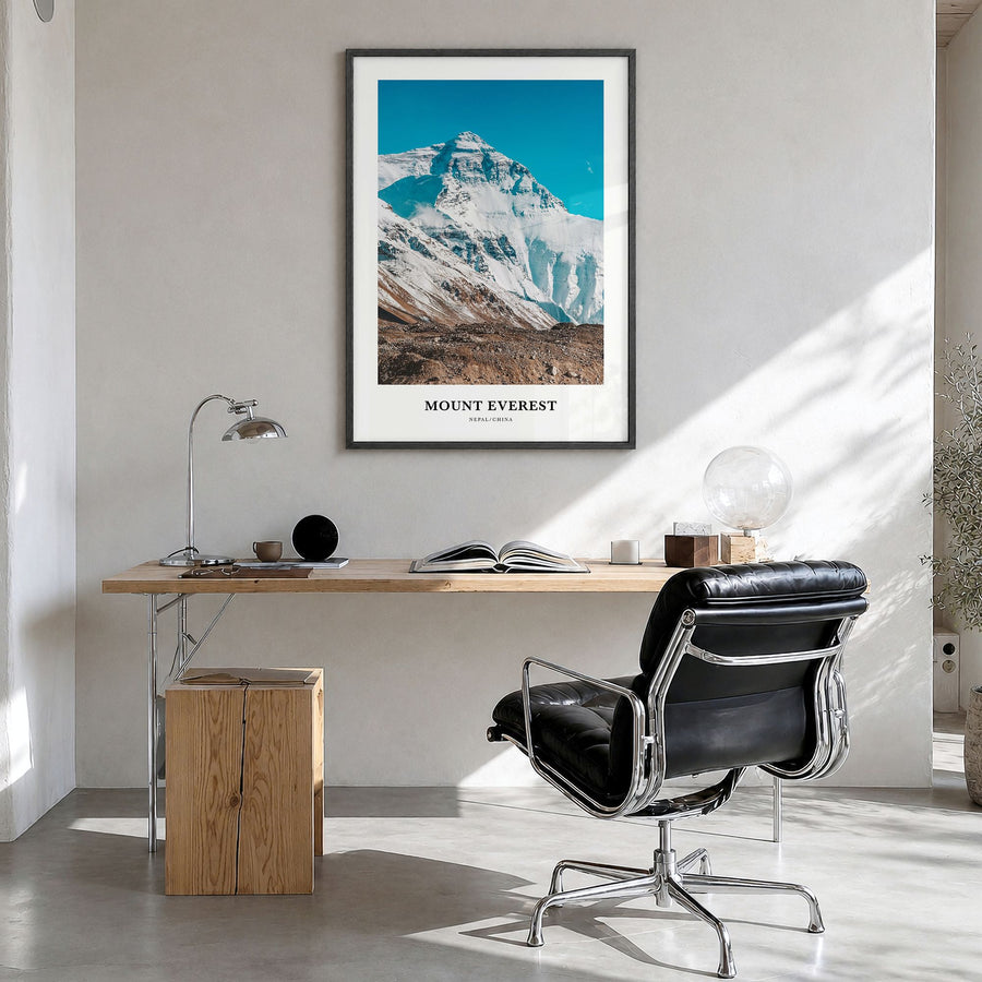 Mount Everest Classic Poster in a black wood frame, hanging in a bright home office