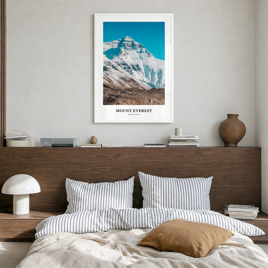 Mount Everest Classic Poster in a white wood frame, hanging in a bedroom