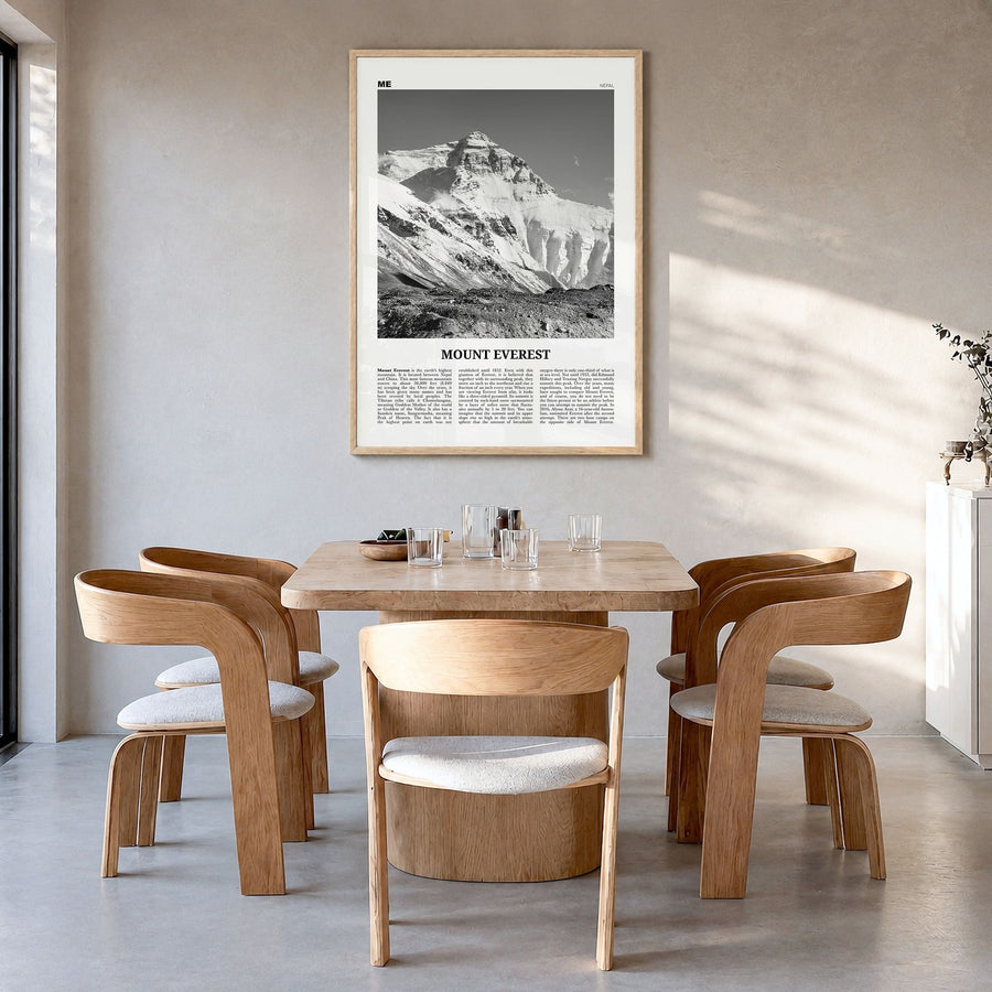 Mount Everest Newspaper Poster in a natural wood frame, hanging in a dining room