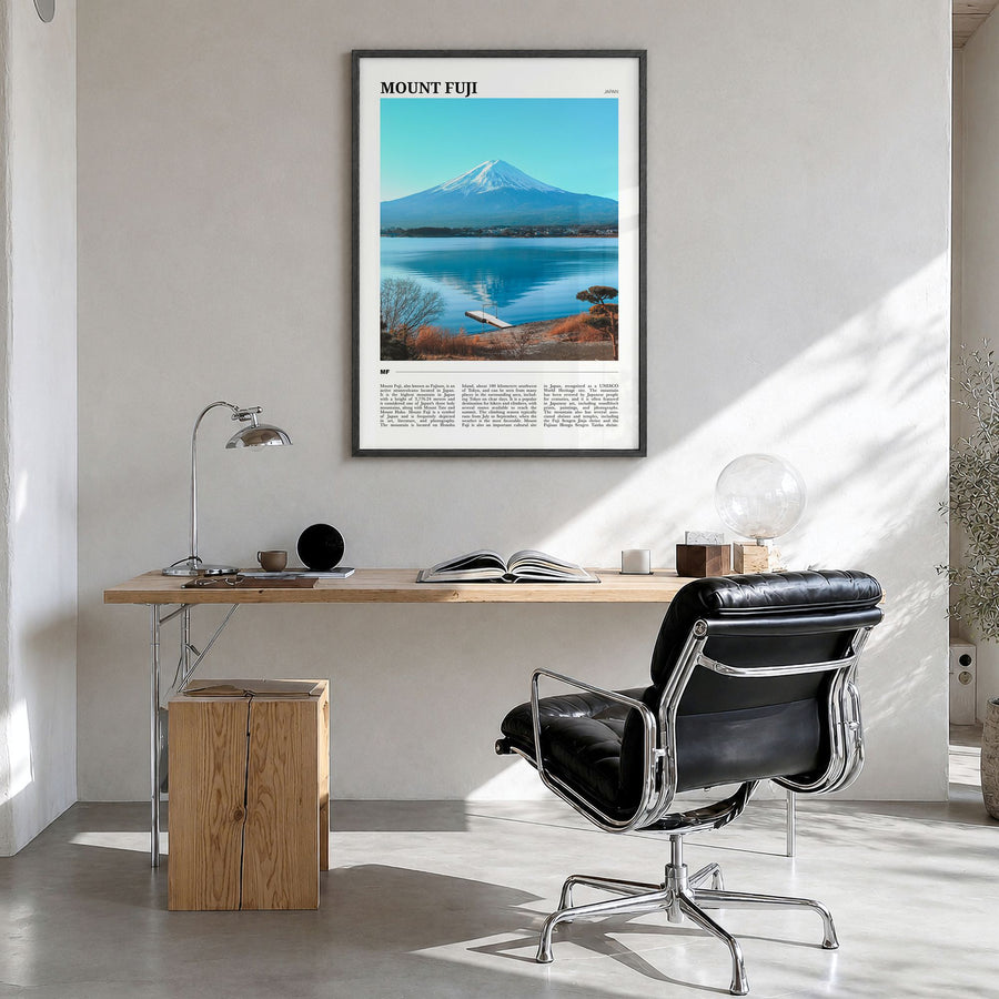 Mount Fuji Travel Poster in a black wood frame, hanging in a bright home office