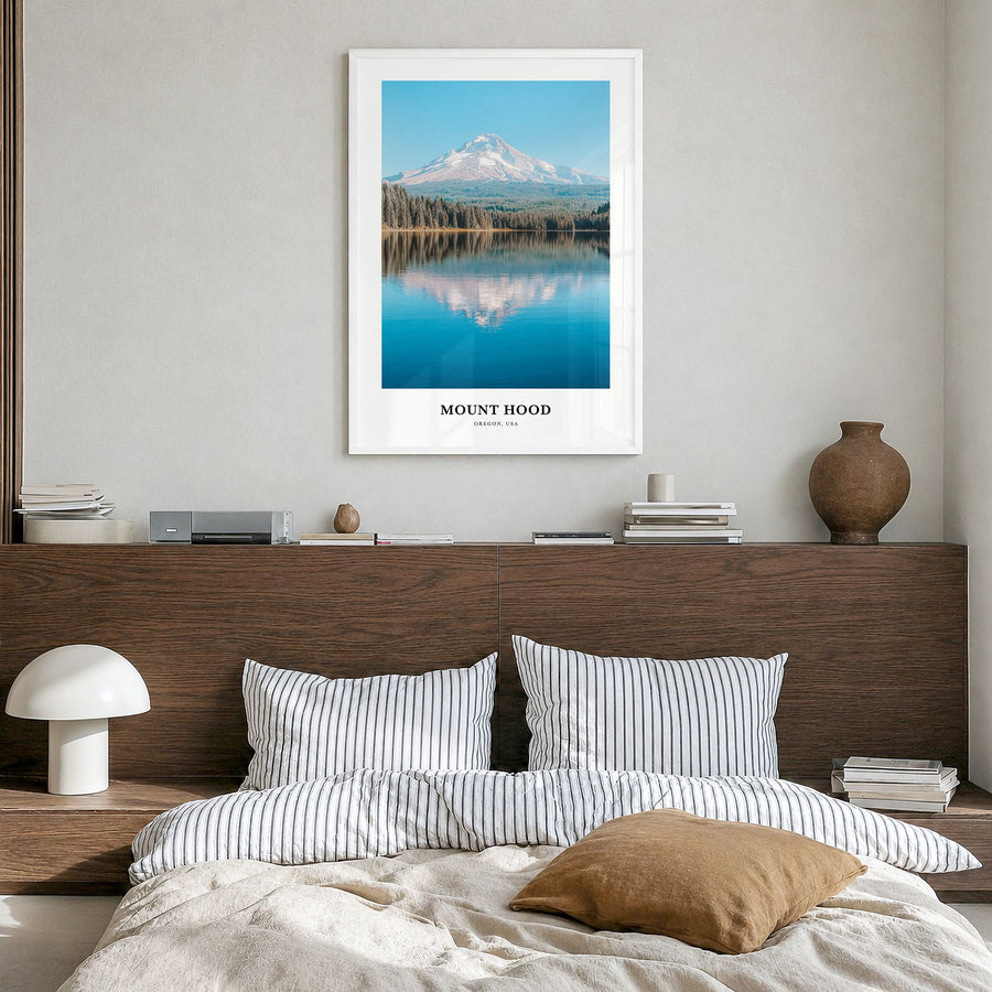 Mount Hood Classic Poster in a white wood frame, hanging in a bedroom