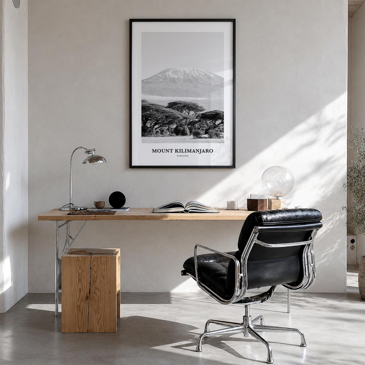 Mount Kilimanjaro black & white classic poster of Tanzania – vertical wall art in black wood frame, hanging on wall