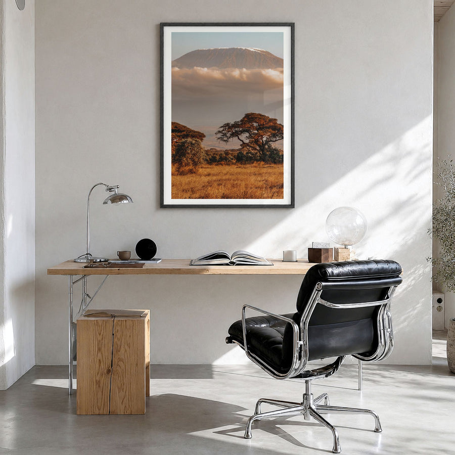 Mount Kilimanjaro Photo No 1 Poster in a black wood frame, hanging in a bright home office, white border