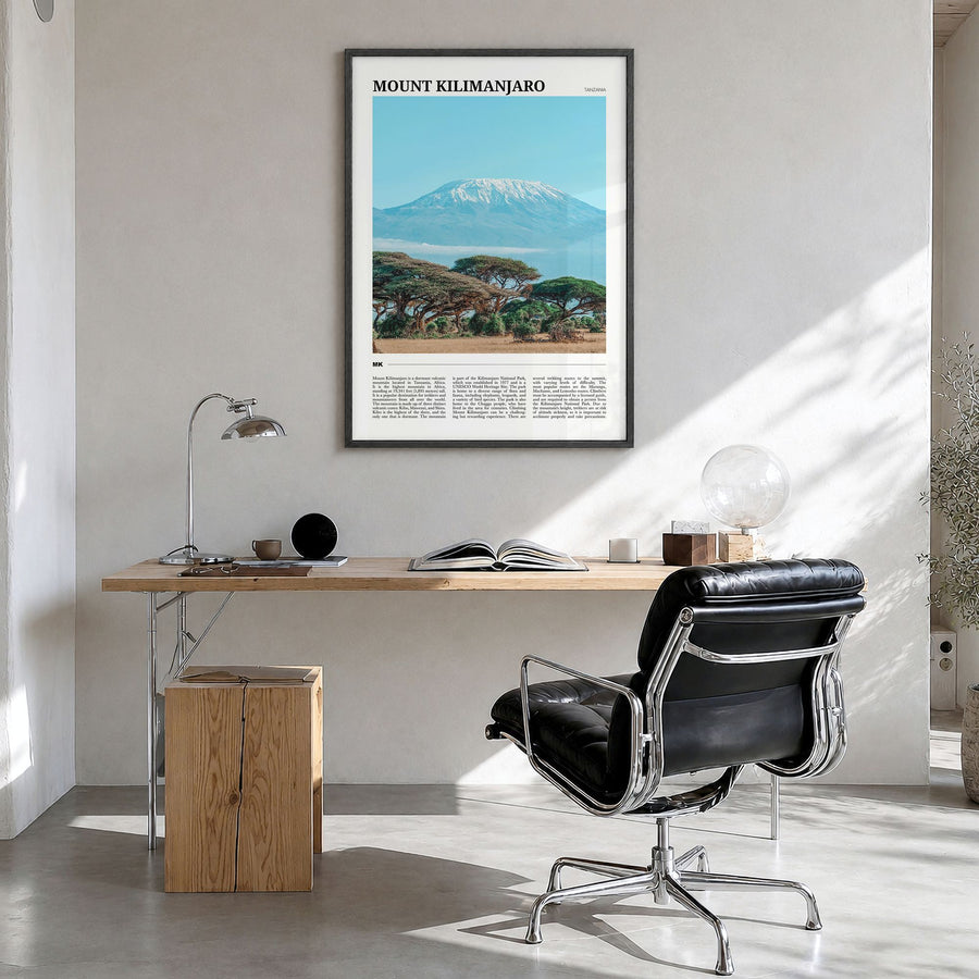 Mount Kilimanjaro Travel Poster in a black wood frame, hanging in a bright home office