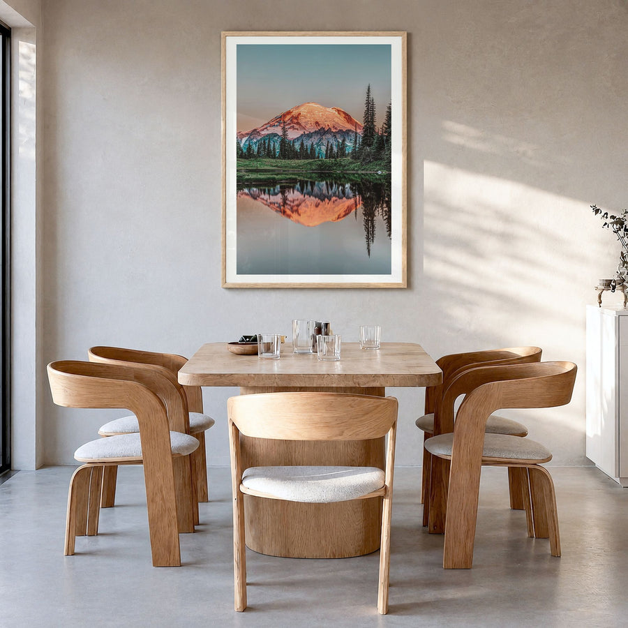 Mount Rainier Photo No 1 Poster in a natural wood frame, hanging in a dining room, white border