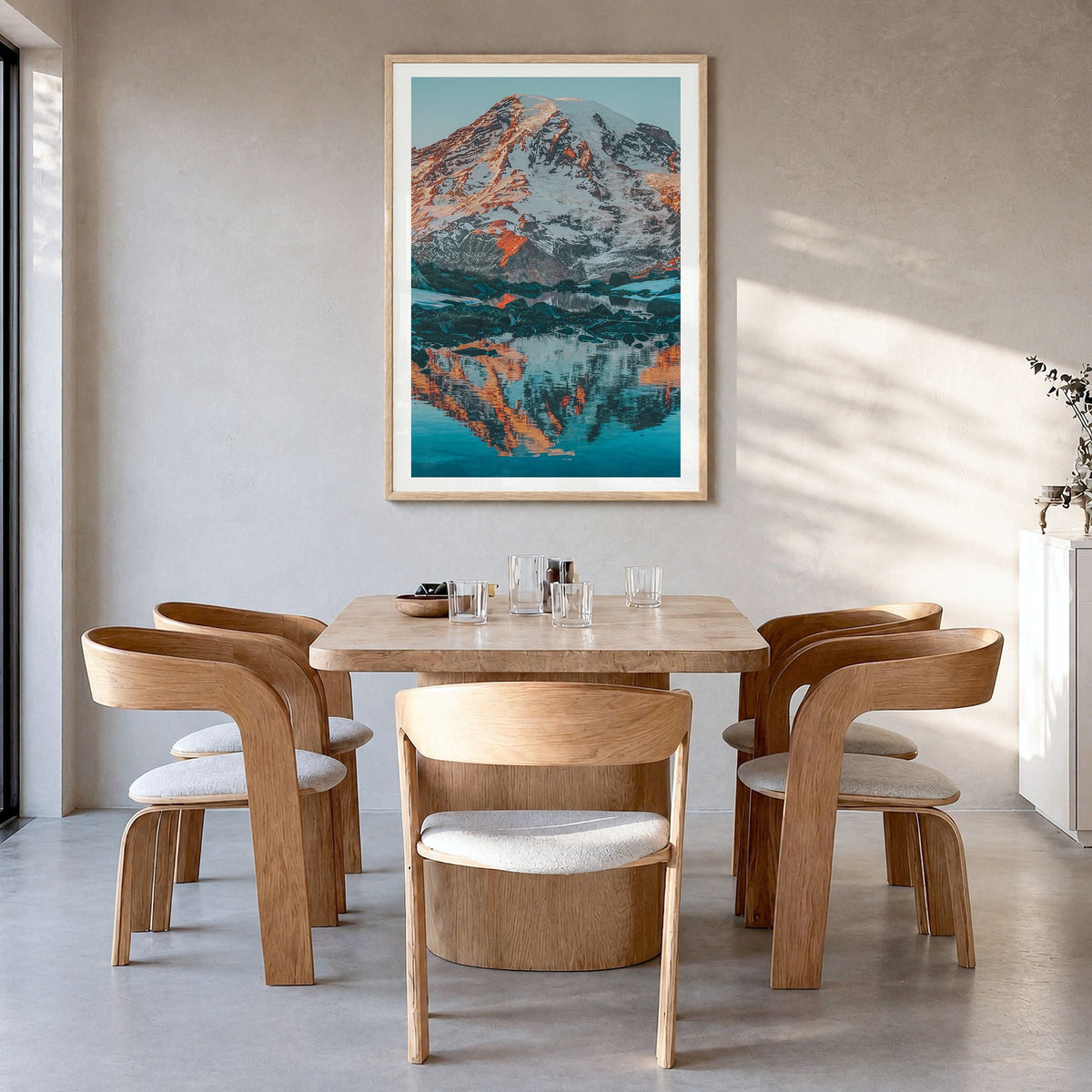 Mount Rainier Photo No 2 Poster in a natural wood frame, hanging in a dining room, white border
