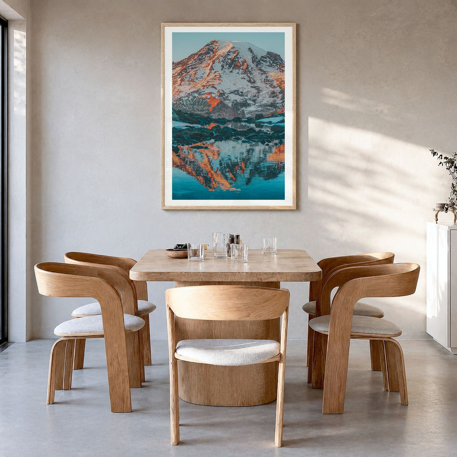 Mount Rainier Photo No 2 Poster in a natural wood frame, hanging in a dining room, white border