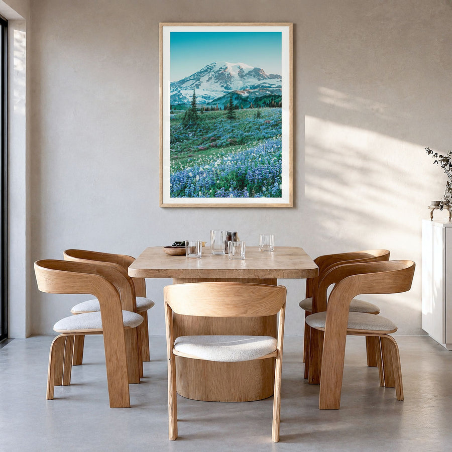 Mount Rainier Photo No 3 Poster in a natural wood frame, hanging in a dining room, white border