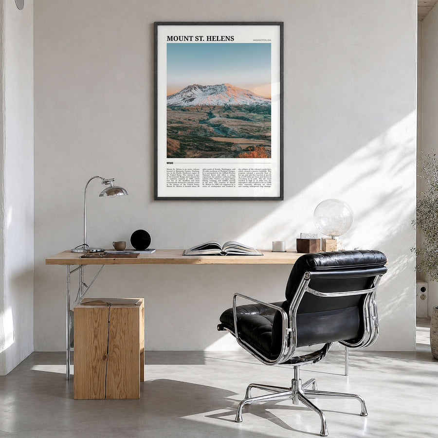 Mount St. Helens Travel Poster in a black wood frame, hanging in a bright home office