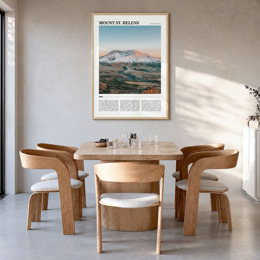 Mount St. Helens Travel Poster in a natural wood frame, hanging in a dining room