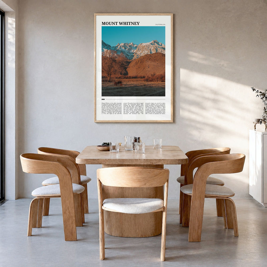 Mount Whitney Travel Poster in a natural wood frame, hanging in a dining room