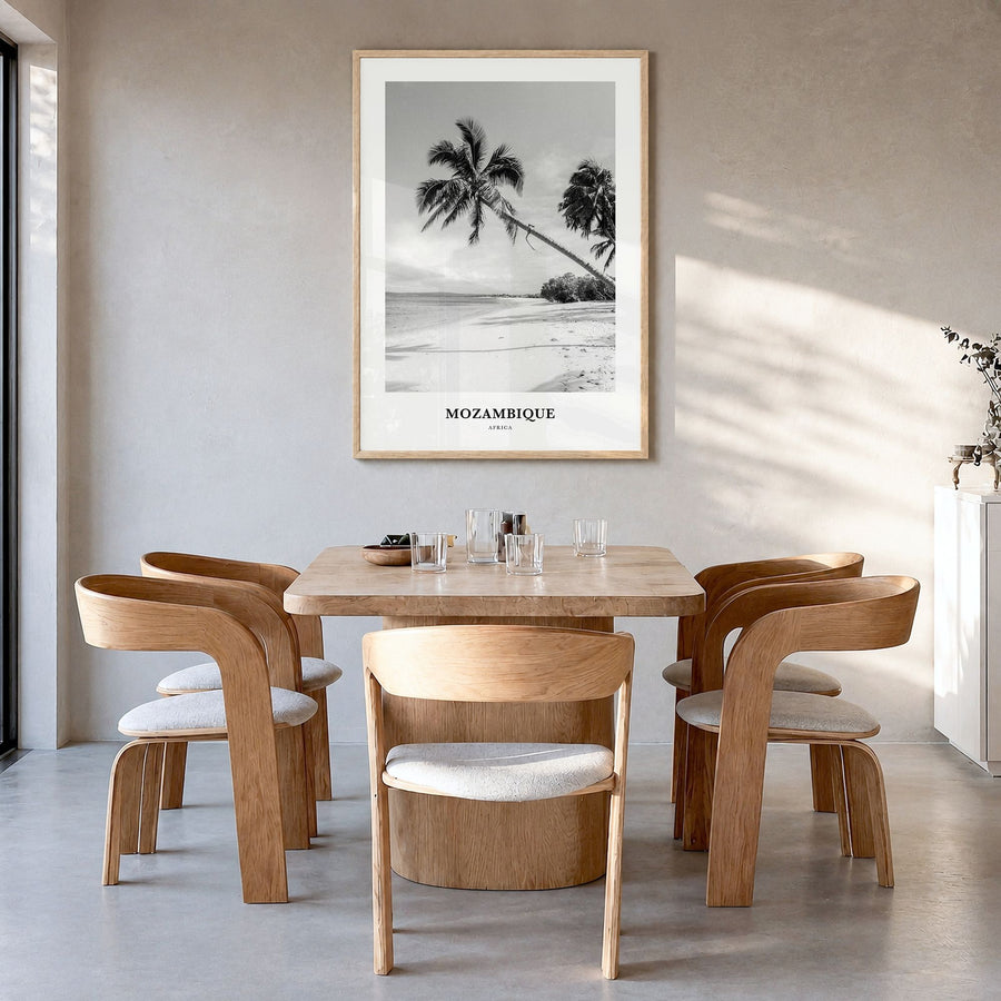 Mozambique Classic Poster in a natural wood frame, hanging in a dining room