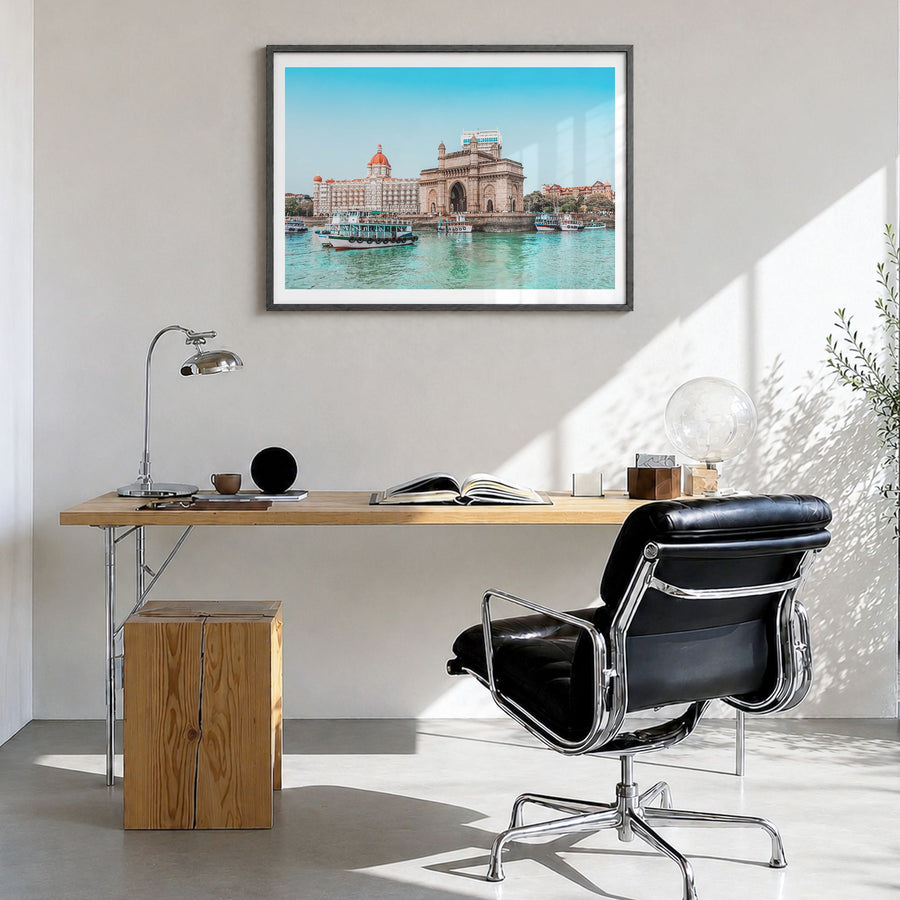 Mumbai Photo Poster in a black wood frame, hanging in a bright home office, white border