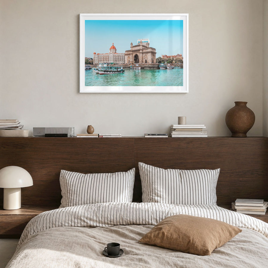 Mumbai Photo Poster in a white wood frame, hanging in a bedroom, white border