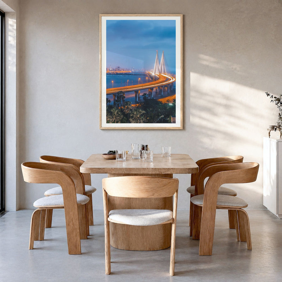 Mumbai Photo No 2 Poster in a natural wood frame, hanging in a dining room, white border
