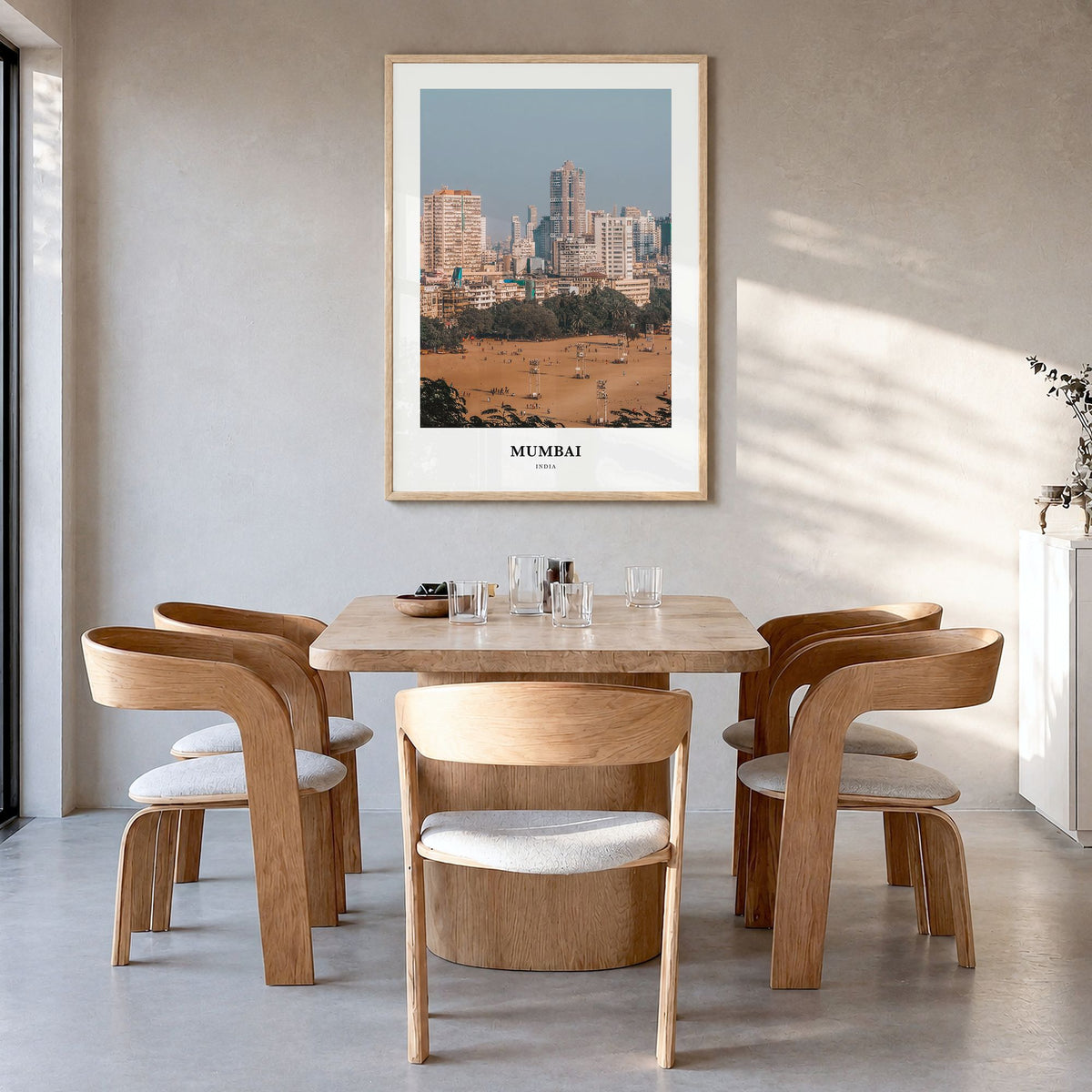 Mumbai Classic Poster in a natural wood frame, hanging in a dining room