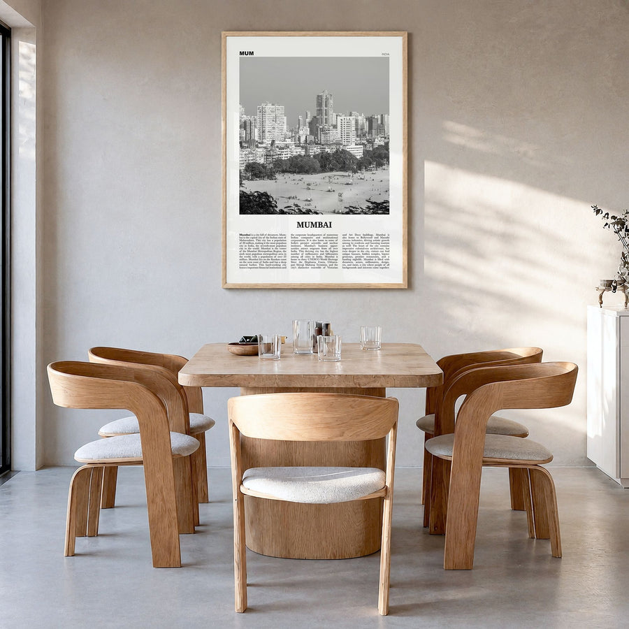 Mumbai Newspaper Poster in a natural wood frame, hanging in a dining room